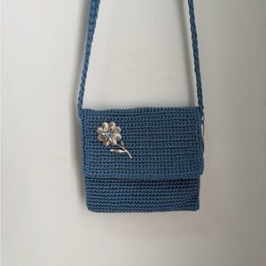 The Sak Crochet Should Purse with flower brooch spring summer